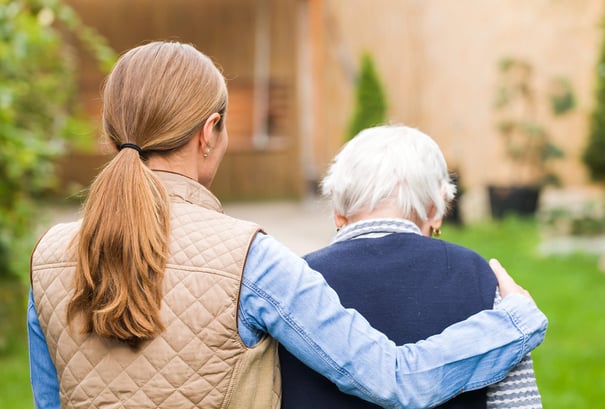 Arbor Terrace Hamilton Mill Resident and Caregiver Hugging