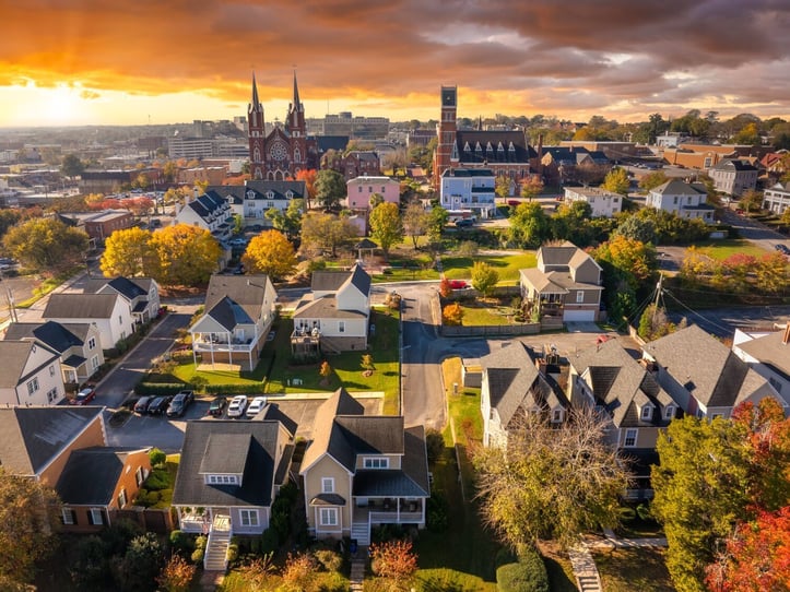 An aerial view of a small-town neighborhood with colorful autumn trees near Winterville, GA, close to Arbor Terrace Athens, offering senior living near Winterville, GA and senior living in Athens, GA.