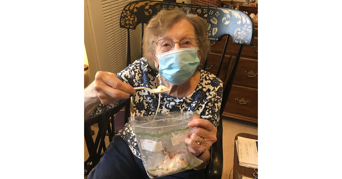 A resident enjoys some homemade ice cream while relaxing in a cozy chair , part of the welcoming senior living near Carrollwood, FL.