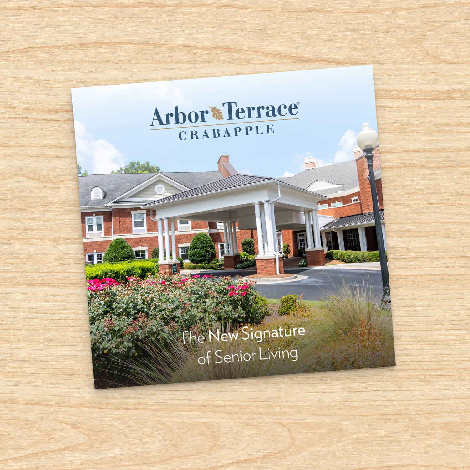 The cover image for the community brochure for Arbor Terrace Crabapple.