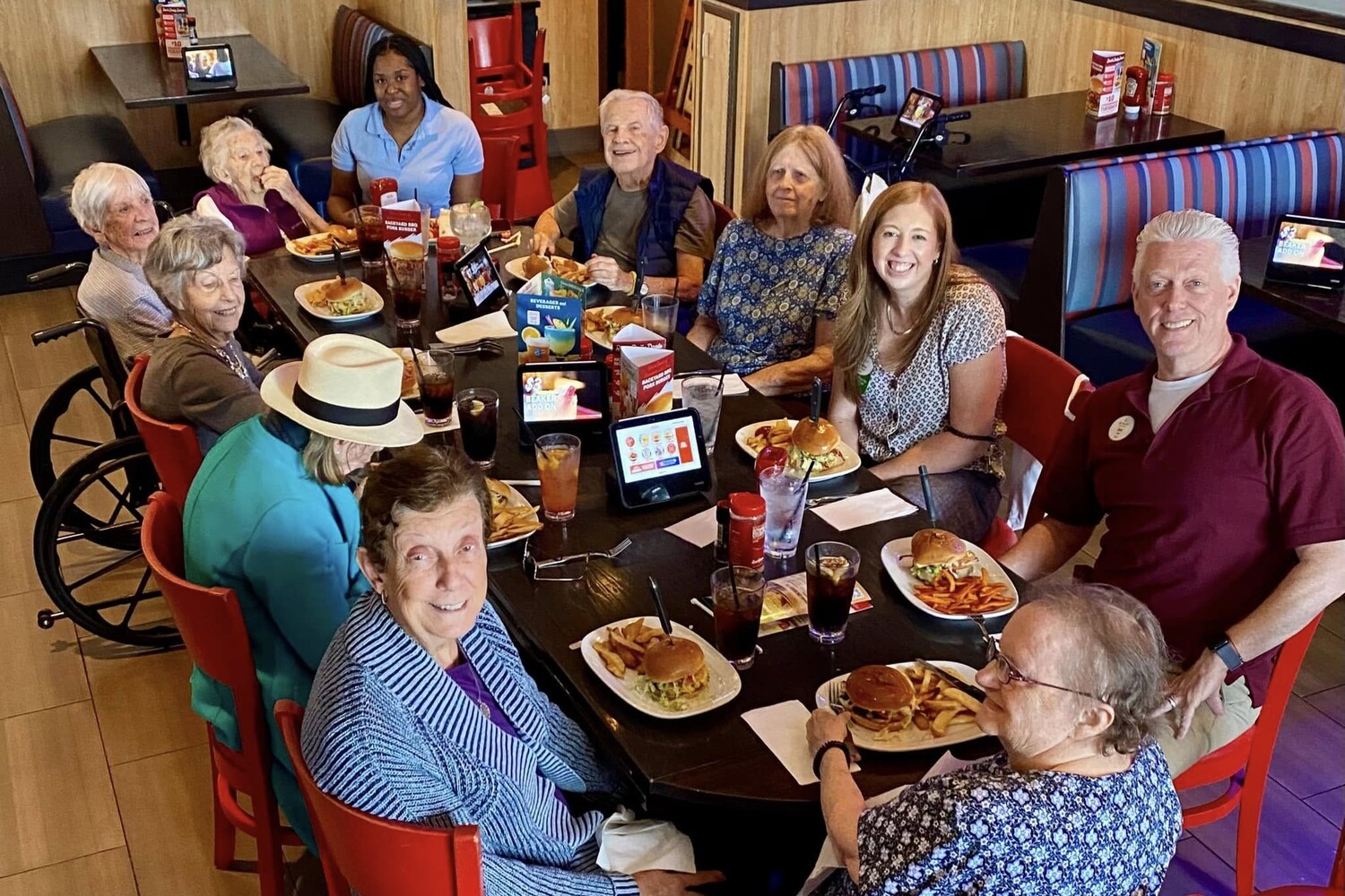 a group of senior living residents enjoying a lunch out