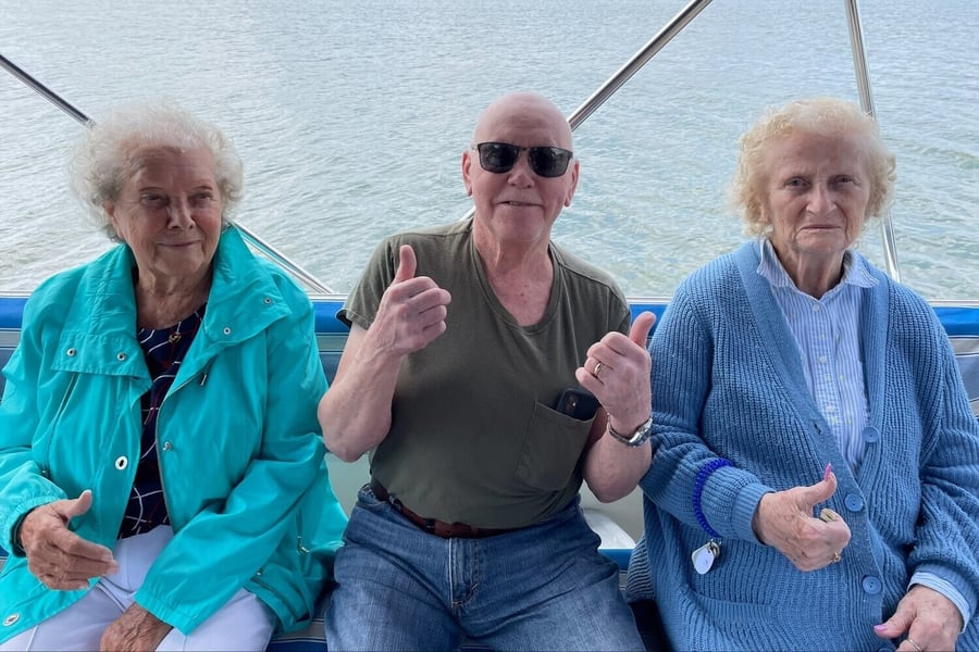 residents on a boat trip