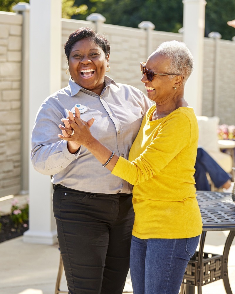 TheArborCompany_SeniorAndEmployeeDancing