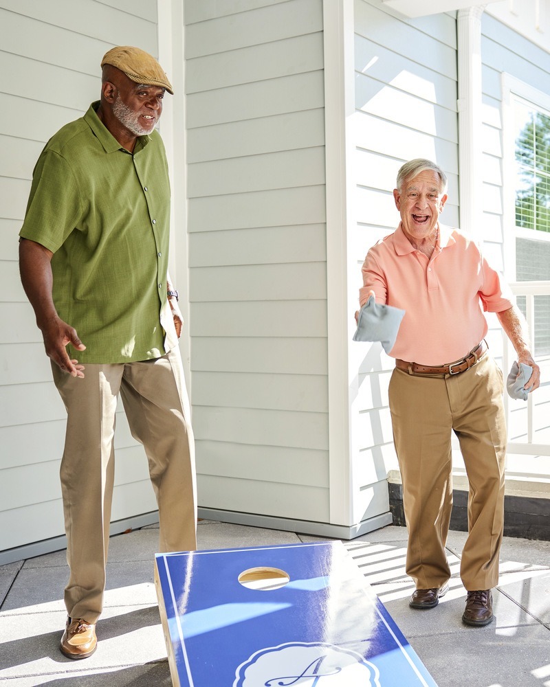 TheArborCompany_SeniorsPlayingCornhole