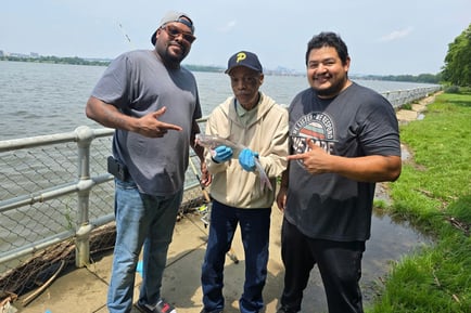 a senior man with staff out on a fishing trip