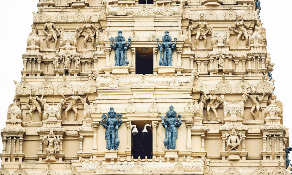 The ornate stone façade of a temple near Arbor Terrace, reflecting the rich cultural diversity and community landmarks available to seniors living in Lanham, MD near Greenbelt.