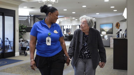 Arbor Terrace Hamilton Mill Resident and Staff Member Walking