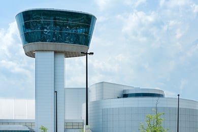 The Steven F. Udvar-Hazy Center's striking control tower and exhibits sit near Dulles Airport, reflecting the convenient senior community near Dulles Airport location of Arbor Terrace Herndon, a senior living Herndon Virginia community.