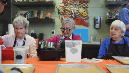 Residents enjoy a hands-on baking activity at Arbor Terrace Highland Park, part of the active senior lifestyle in Highland Park, IL. These moments of connection capture what senior living in Highland Park, IL is all about.