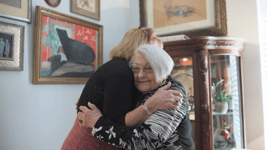 knoxville - a senior lady hugging a loved one