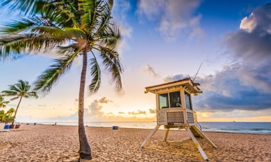 A peaceful beachside scene at Crandon Park at sunset, near this active senior living community in Miami, FL, where residents enjoy easy access to pristine coastal parks and open skies.