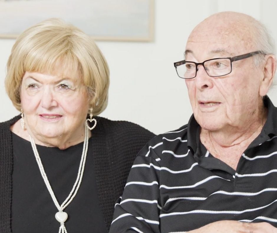 A couple seated together and sharing a quiet moment at this senior living community in Lake Worth, Florida, enjoying the warmth and connection that comes with life at The Arbor at Lake Worth.