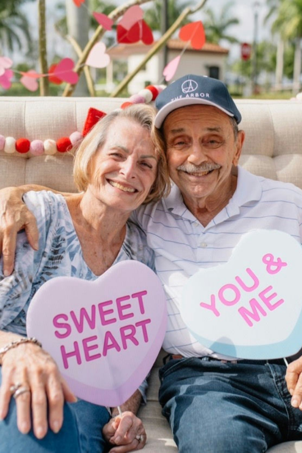 a senior couple celebrating valentines day at a senior living community
