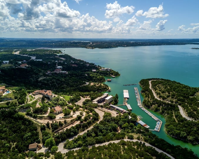 An aerial view of Steiner Ranch along the Lake Travis shoreline, a planned community close to Arbor Terrace Lakeway senior living in Lakeway, TX.