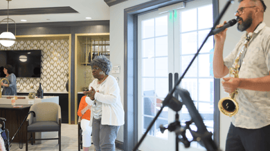 Arbor Terrace Marlton residents listening and dancing to live music