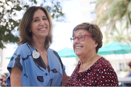 Mirabelle employee dancing with a Mirabelle resident