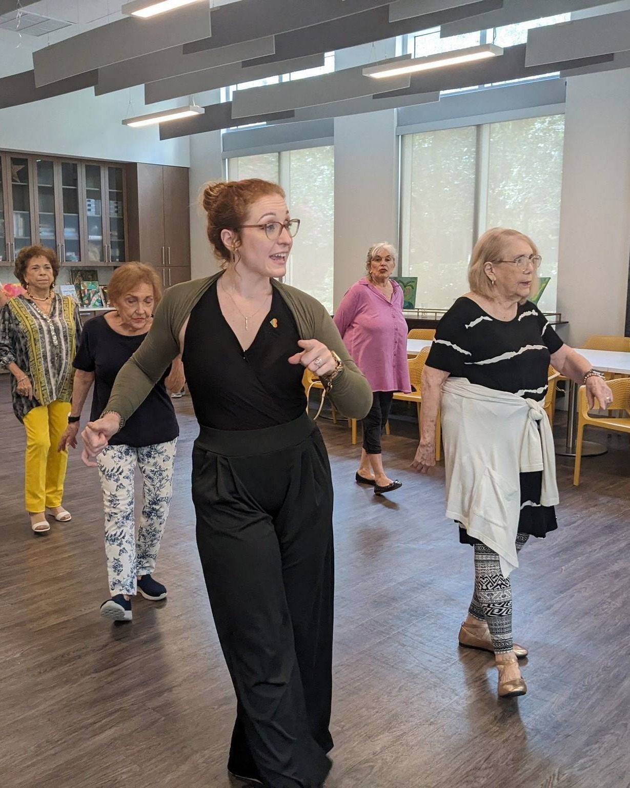 Mirabelle_Instructor teaches residents how to dance