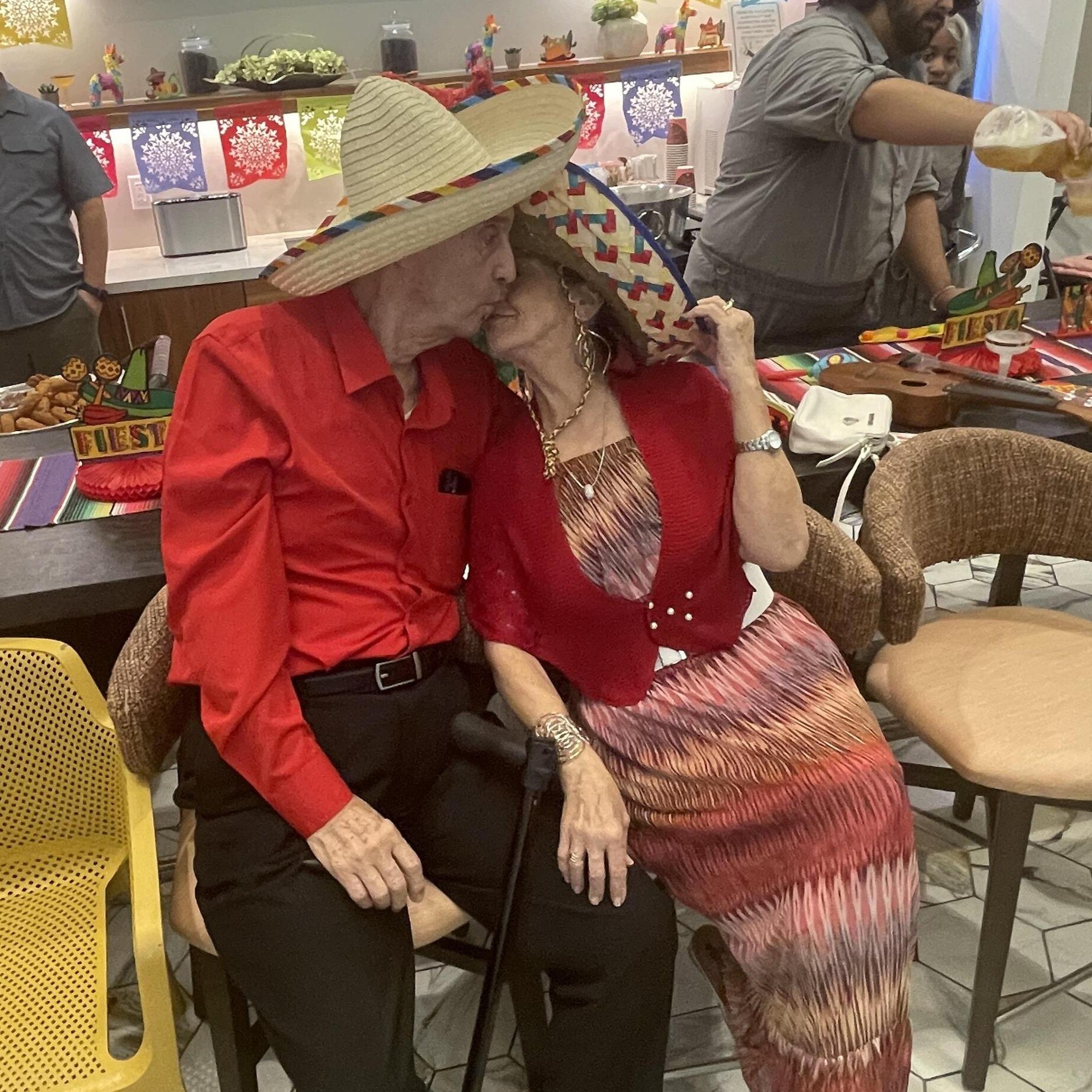 Mirabelle_Residents share a kiss during cinco celebration