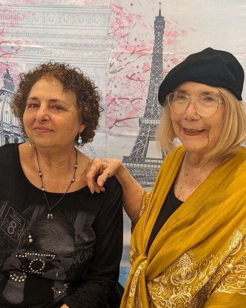 mirabelle_residents smiling in a paris themed party