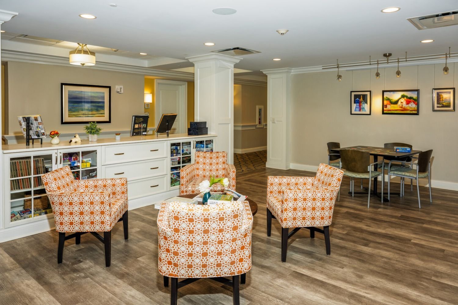 a room for the community residents to gather and do activities/hang out/play games in Arbor Terrace Monmouth