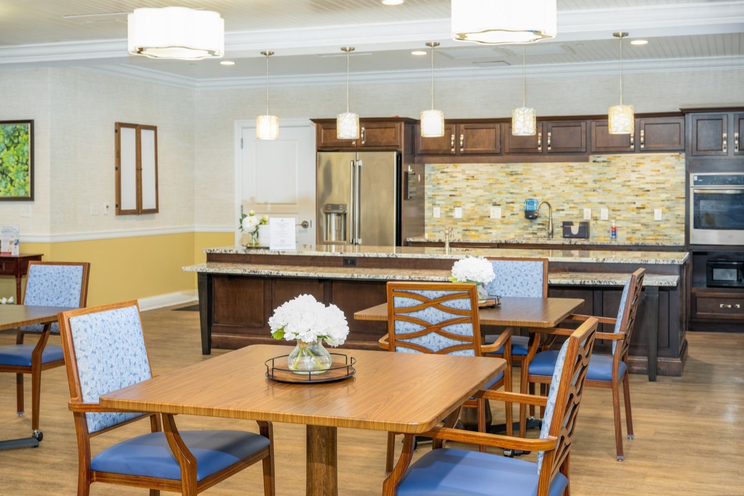 dining area and a food bar/island in Arbor Terrace Monmouth