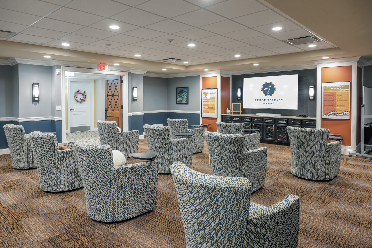 movie theater room with various comfy seats in Arbor Terrace Monmouth