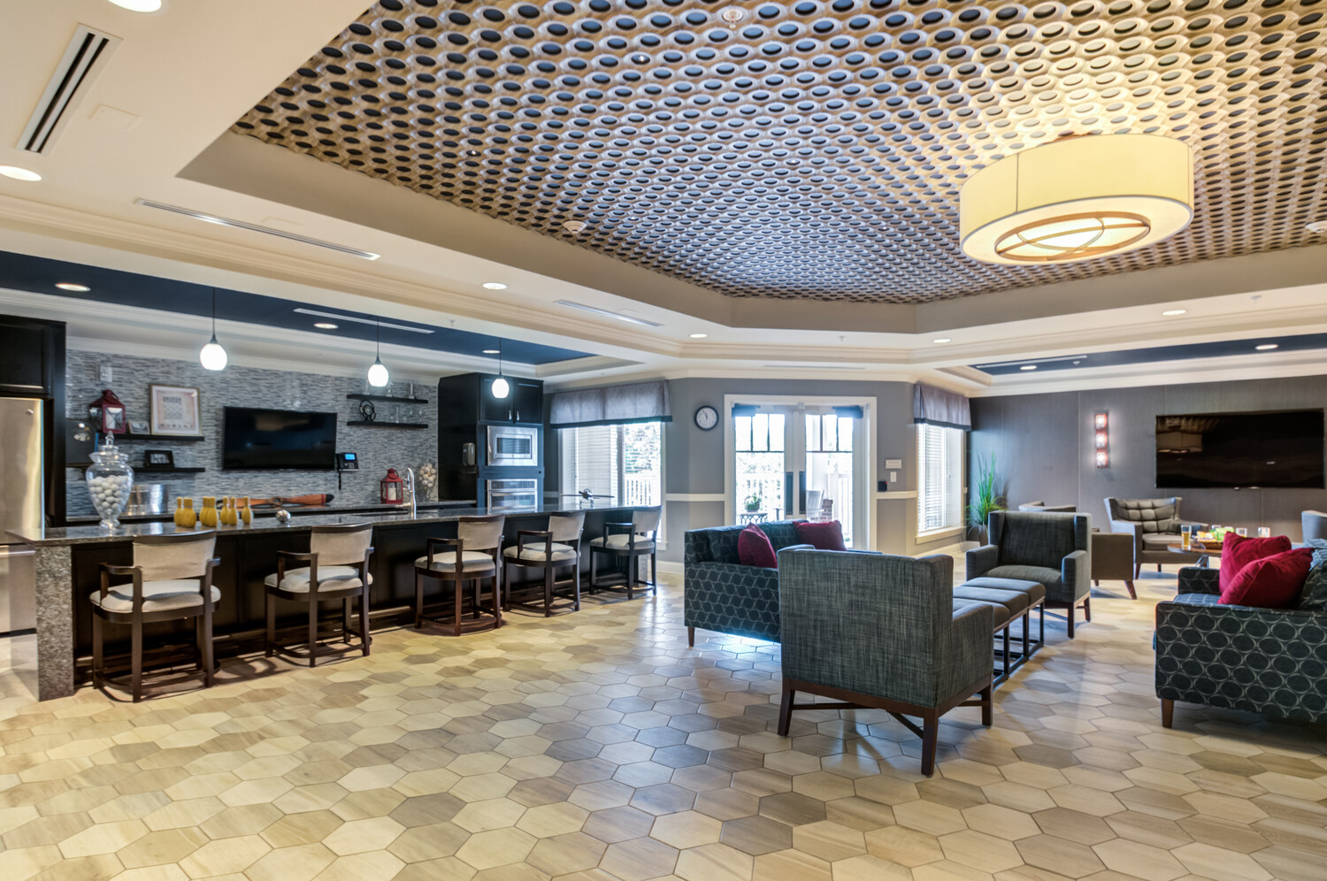 Bright and modern common area at Arbor Terrace Morris Plains, a senior living community in New Jersey, designed for residents to enjoy leisure and relaxation.