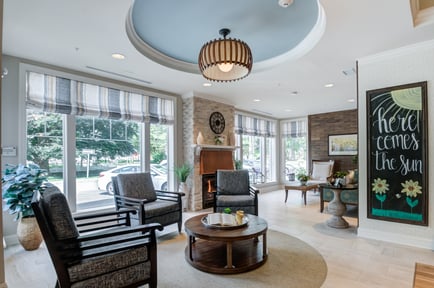 A welcoming sunroom at Arbor Terrace Morris Plains, a senior living community in New Jersey, with bright natural light and an inviting atmosphere.