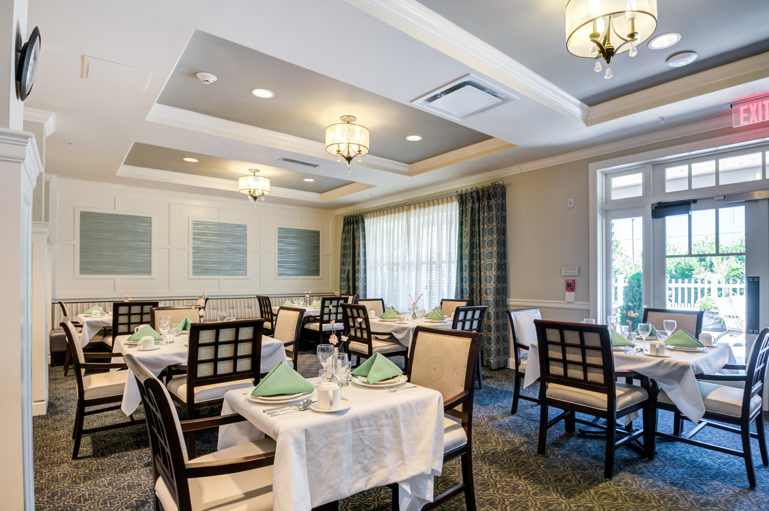 Sophisticated dining area at Arbor Terrace Morris Plains, a senior living community in Morris Plains, NJ, designed to offer residents an upscale dining experience in a warm setting.