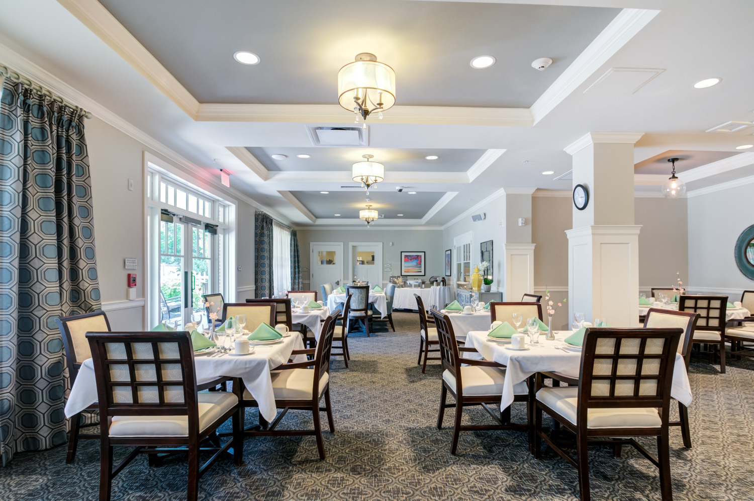 Spacious dining room at Arbor Terrace Morris Plains, a senior living community in New Jersey, designed for residents to enjoy delicious meals with friends and family.