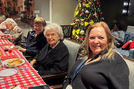 Residents and staff members enjoying an outing at an Italian restaurant 