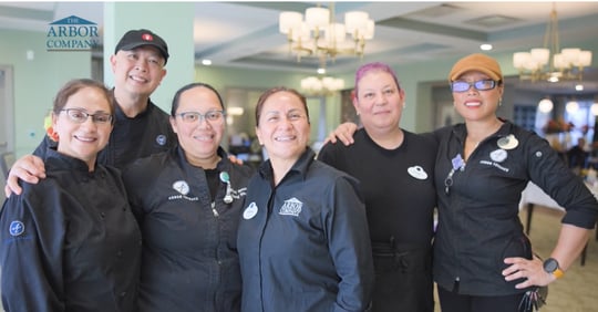 Arbor Terrace Naperville - A group of dining staff smiling for the camera (1)
