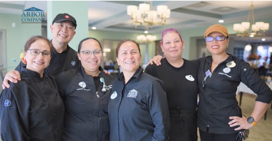 Arbor Terrace Naperville - A group of dining staff smiling for the camera (1)