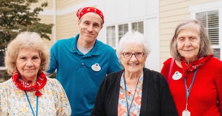 Brian Parks outside iwth the residents participating in an activity
