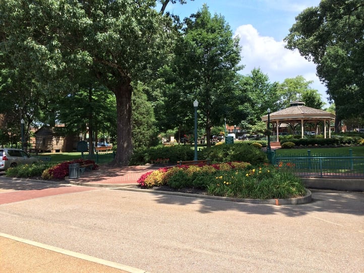 A shaded historic town square gazebo in Collierville, TN, a charming community within easy reach of Opus East Memphis senior living in the greater Memphis, Tennessee area.