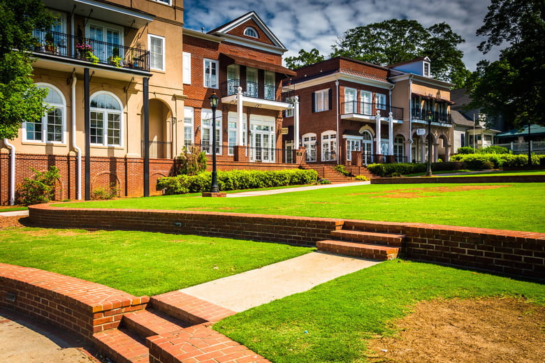 Historic mixed-use architecture in downtown Duluth, GA, a lively nearby community with shopping, dining, and cultural attractions close to senior living in Suwanee, GA.