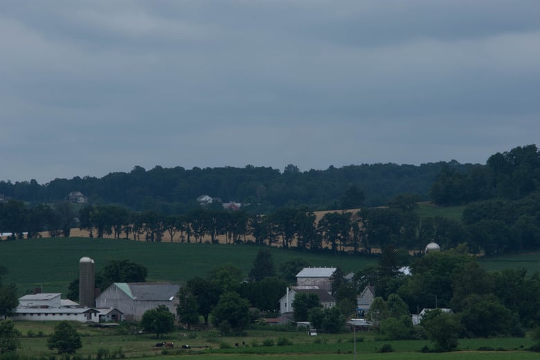 A dusky hillside view overlooking the town of Exton, PA, conveniently located near Arbor Terrace Willistown senior living West Chester Pennsylvania.