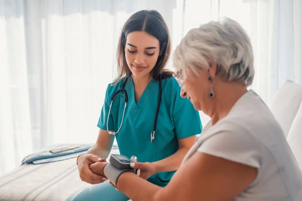 Nurse and staff member performing a test