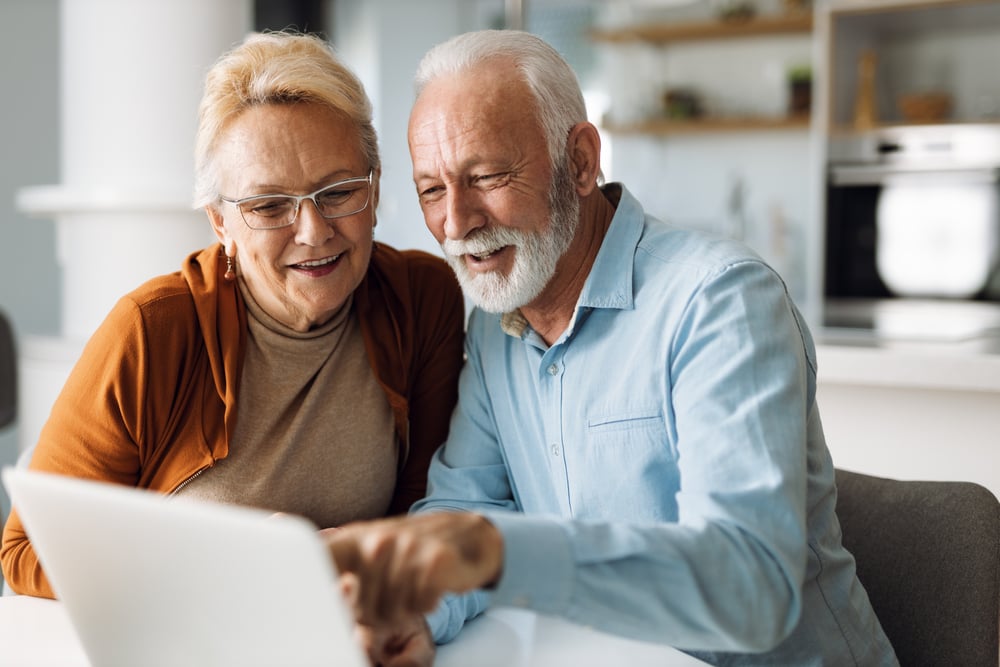 Residents looking at a computer screen