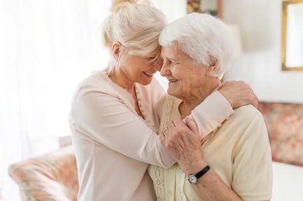 Resident and Caregiver Embracing