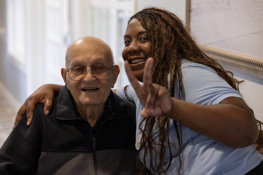 Doylestown resident and staff member smiling