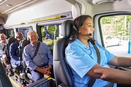 a group of seniors on a bus trip