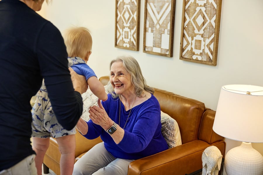 Arbor Terrace Hamilton Mill Senior holding baby