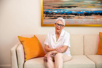 senior lady sitting on sofa