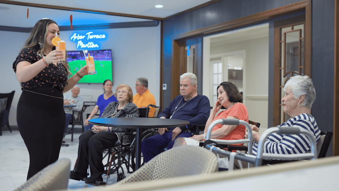 Arbor Terrace Marlton having an activity with drinks 