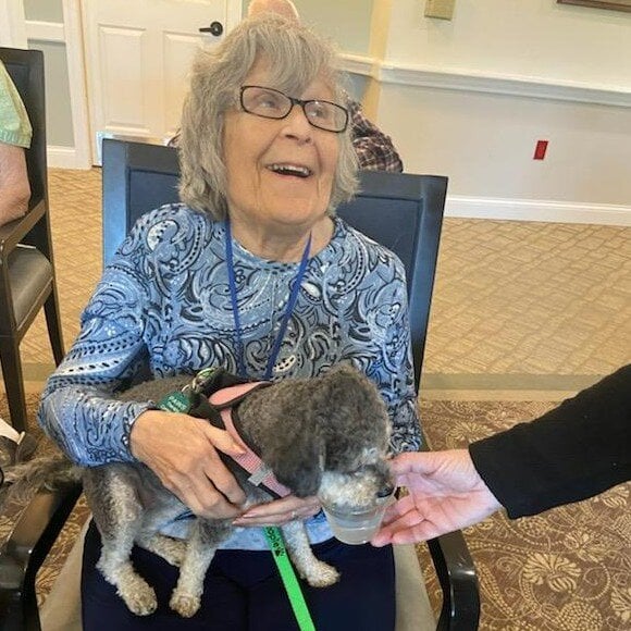 Willistown_resident cuddling a pup