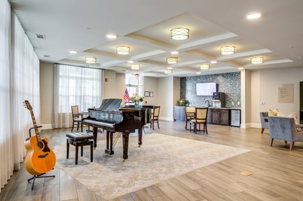 Arbor Terrace Hamilton Mill Lobby Area with a Grand Piano