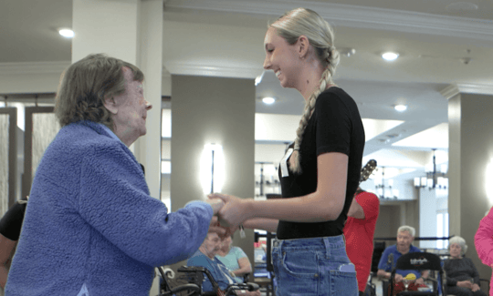 Cooper City Resident dancing at event