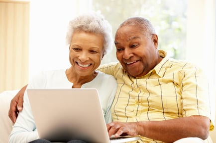 marlton resident couple looking at a computer