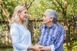 Resident and Caregiver embracing